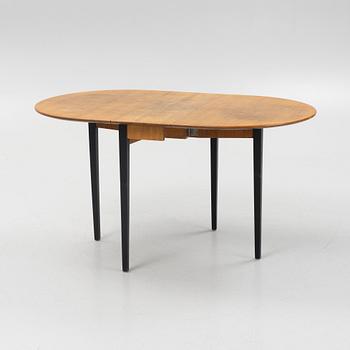 A gate-leg table, mid 20th Century.