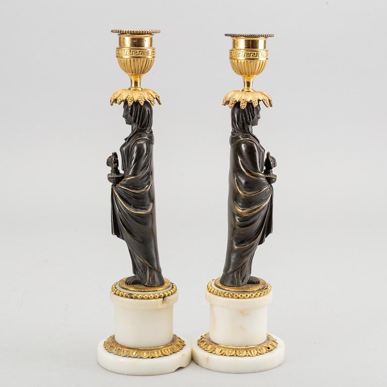 A pair of Louis XVI 18/19 century candlesticks.