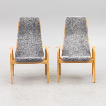 Yngve Ekström, a pair of "Lamino" armchairs for Swedese.