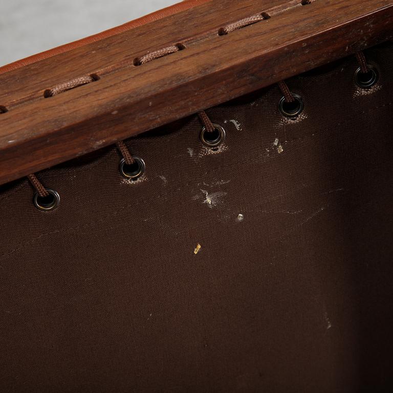 Torbjørn Afdal, a 'Hunter' leather easy chair and ottoman, Bruksbo, Norway, 1960's/70's.