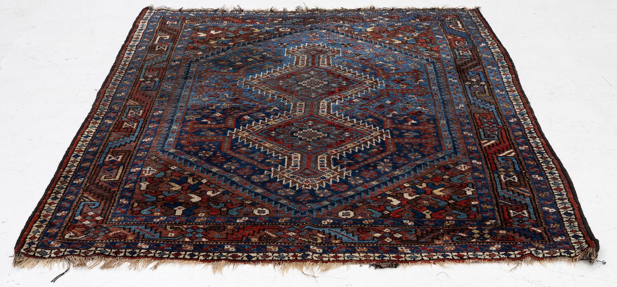 A Khamseh rug, antique, c. 192 x 155 cm.