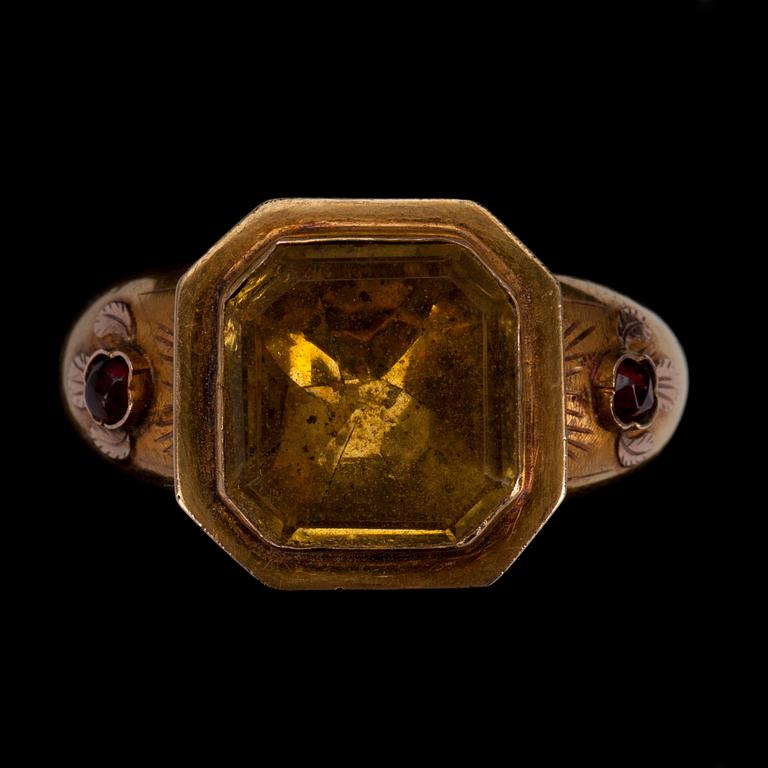 RING, 18K guld, glas, granat. G. A. Weckman Tavastehus 1863. Vikt 4,7 g.