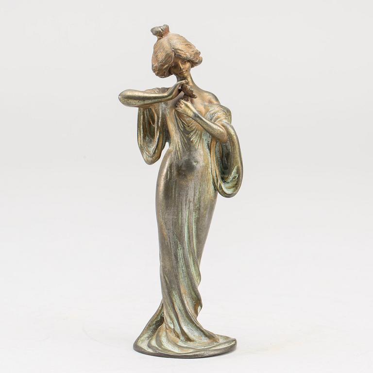 L ALLIOL, a signed patinated bronze figurine.