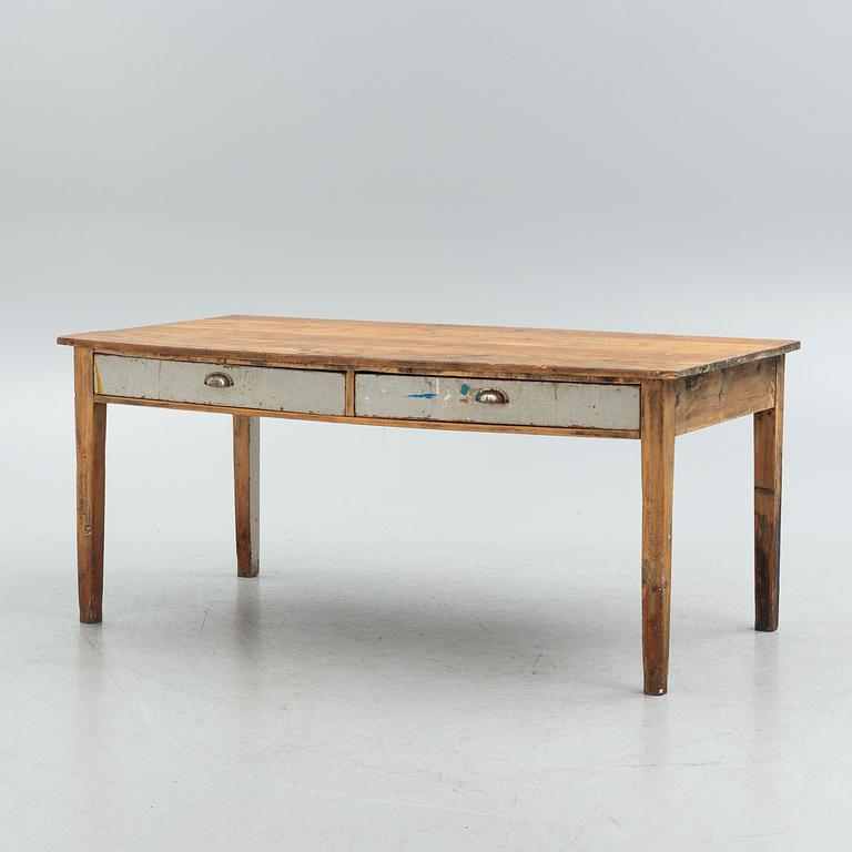 An early 20th century pine table.