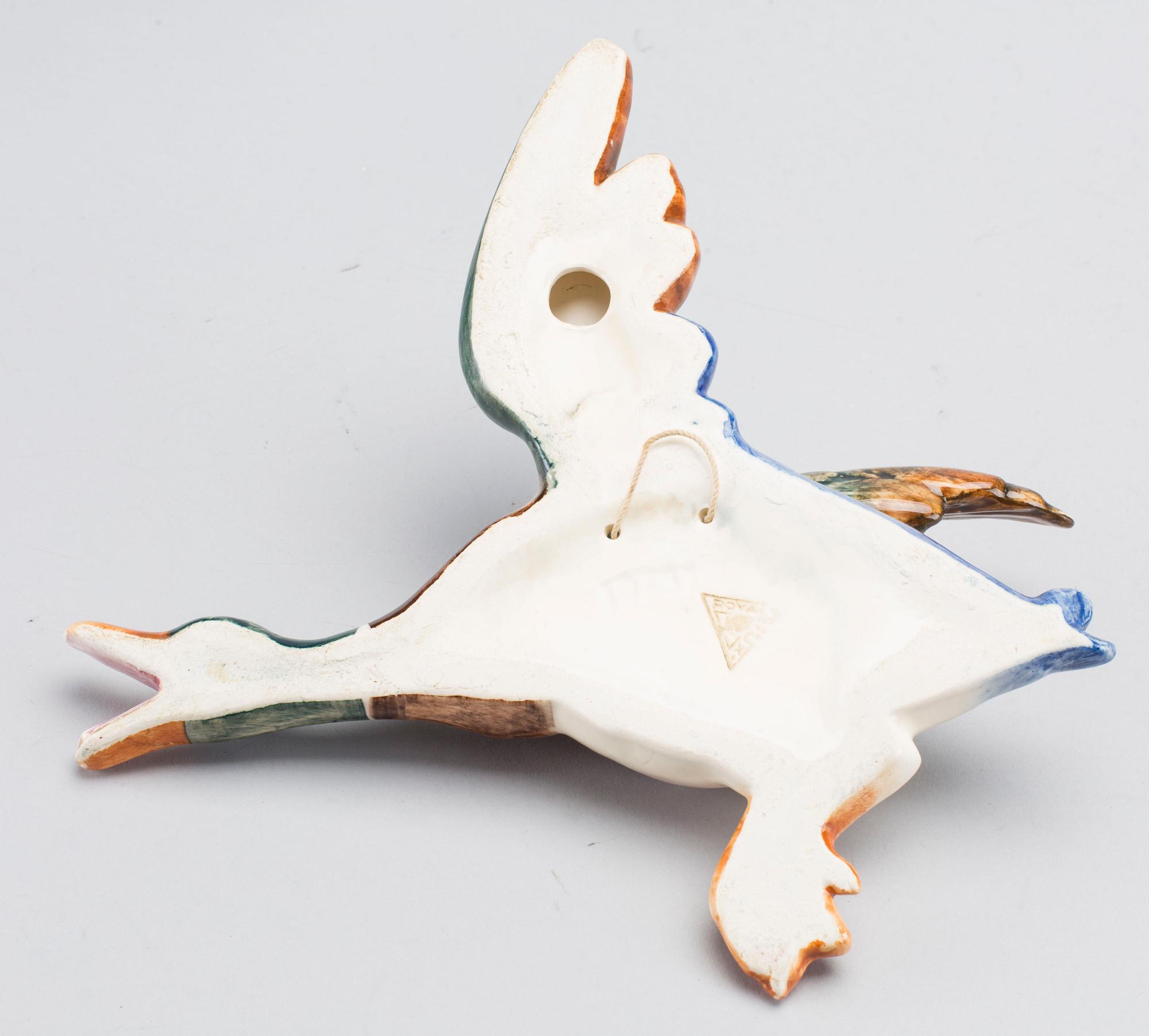 A SET OF THREE ROYAL DUX FLYING DUCKS.