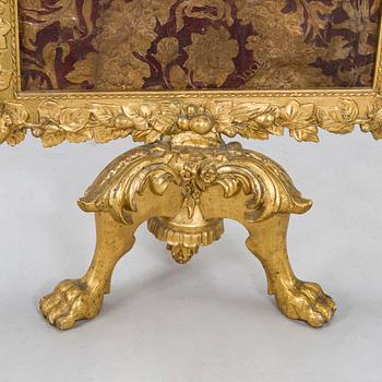 A Baroque style/Rococo revival brass protection, late 19th century.