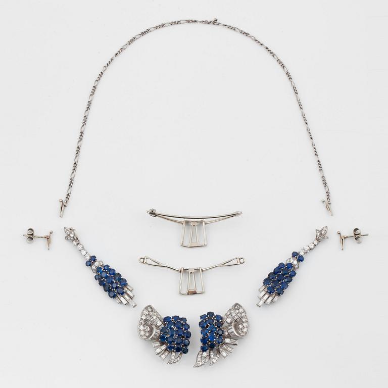 A diamond and sapphire set, probably Garrard & co. The set can be worn as a necklace, earrings, double clip or brooch.