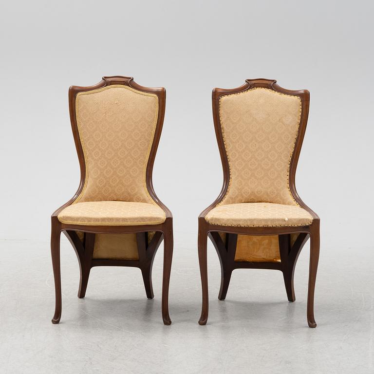 A pair of mahogany art nouveau chairs by Edward Colonna for Samuel Bing, Paris, early 20th Century.
