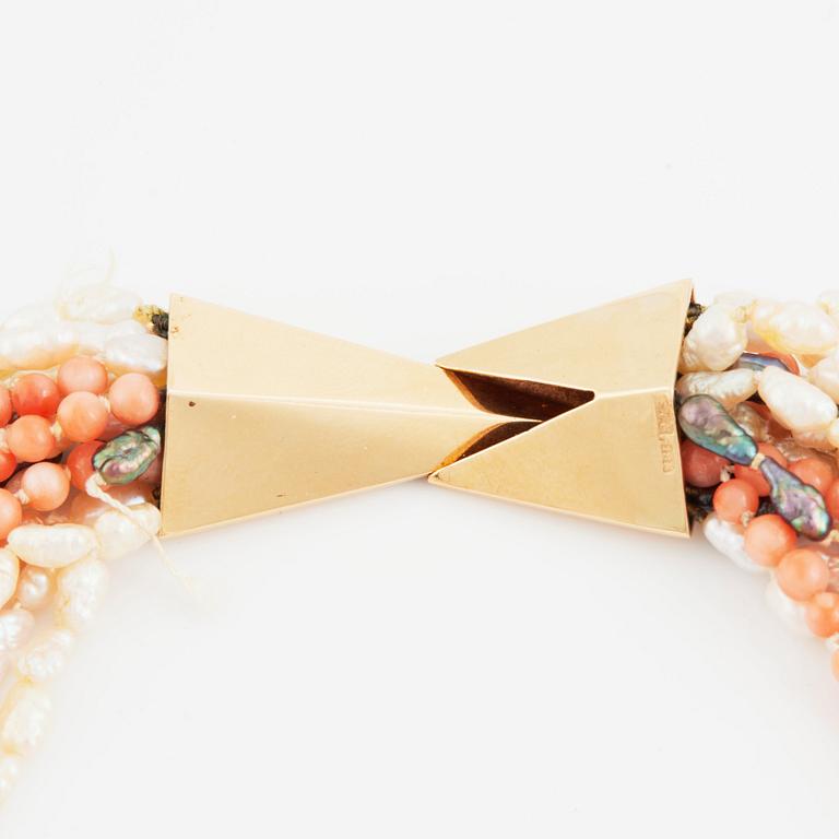 Kristian Nilsson, a cultured pearl and coral necklace with an 18K gold clasp.