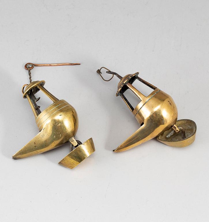 Two 18th century bronze oil lamps.