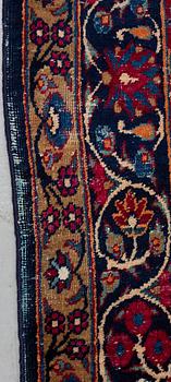 A carpet, an antique/a semi-antique Yezd, ca 557-562 x 366,5-370,5 cm.