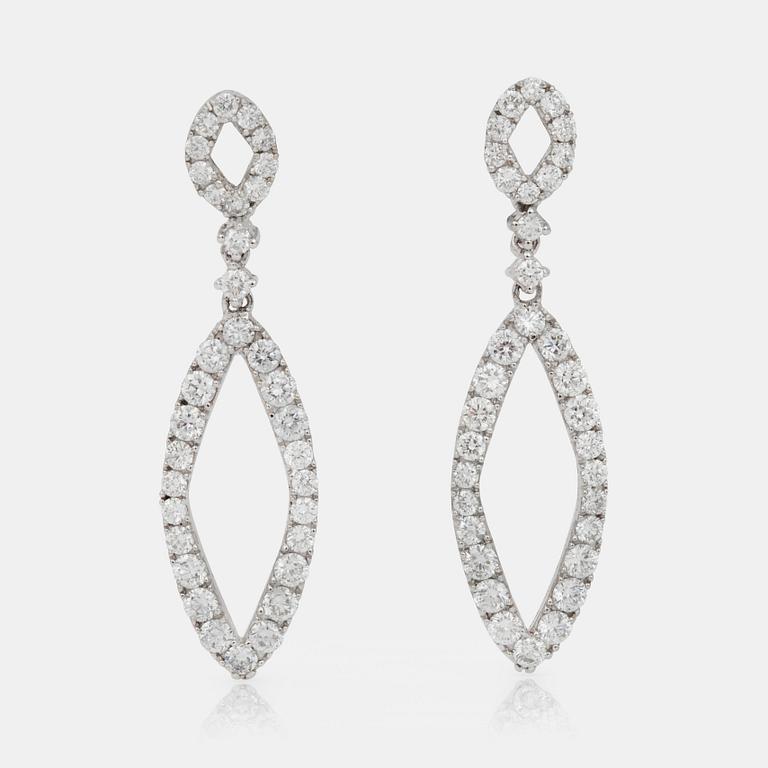 A pair of diamond earrings, 1.50 cts according to engraving.