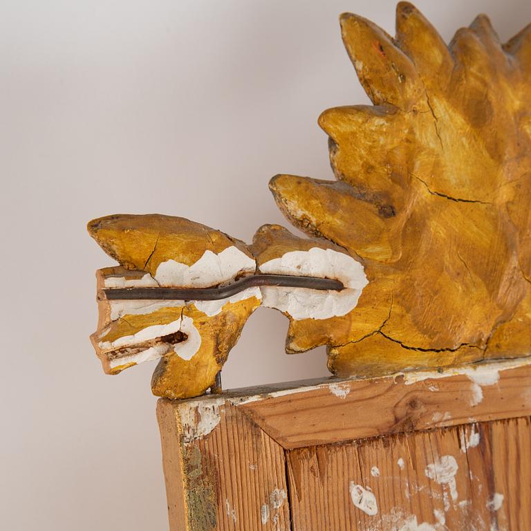A mirror and console table from around the year 1900.