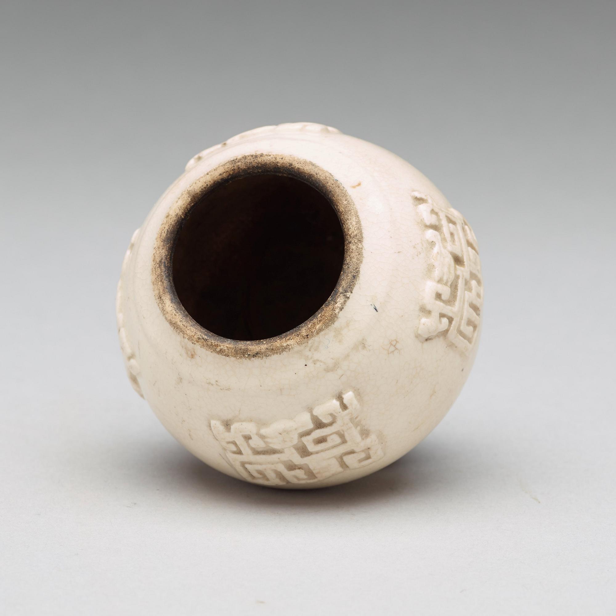 A white glazed brush washer, Ming dynasty, 17th Century.