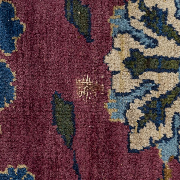 An antique rug, north-west Persian, so-called Vaghire, approx. 136 x 134 cm.