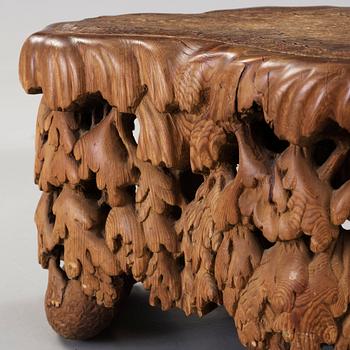 Knut Fjaestad, an Art Nouveau sculptured pine table/stool, Sweden ca 1900.