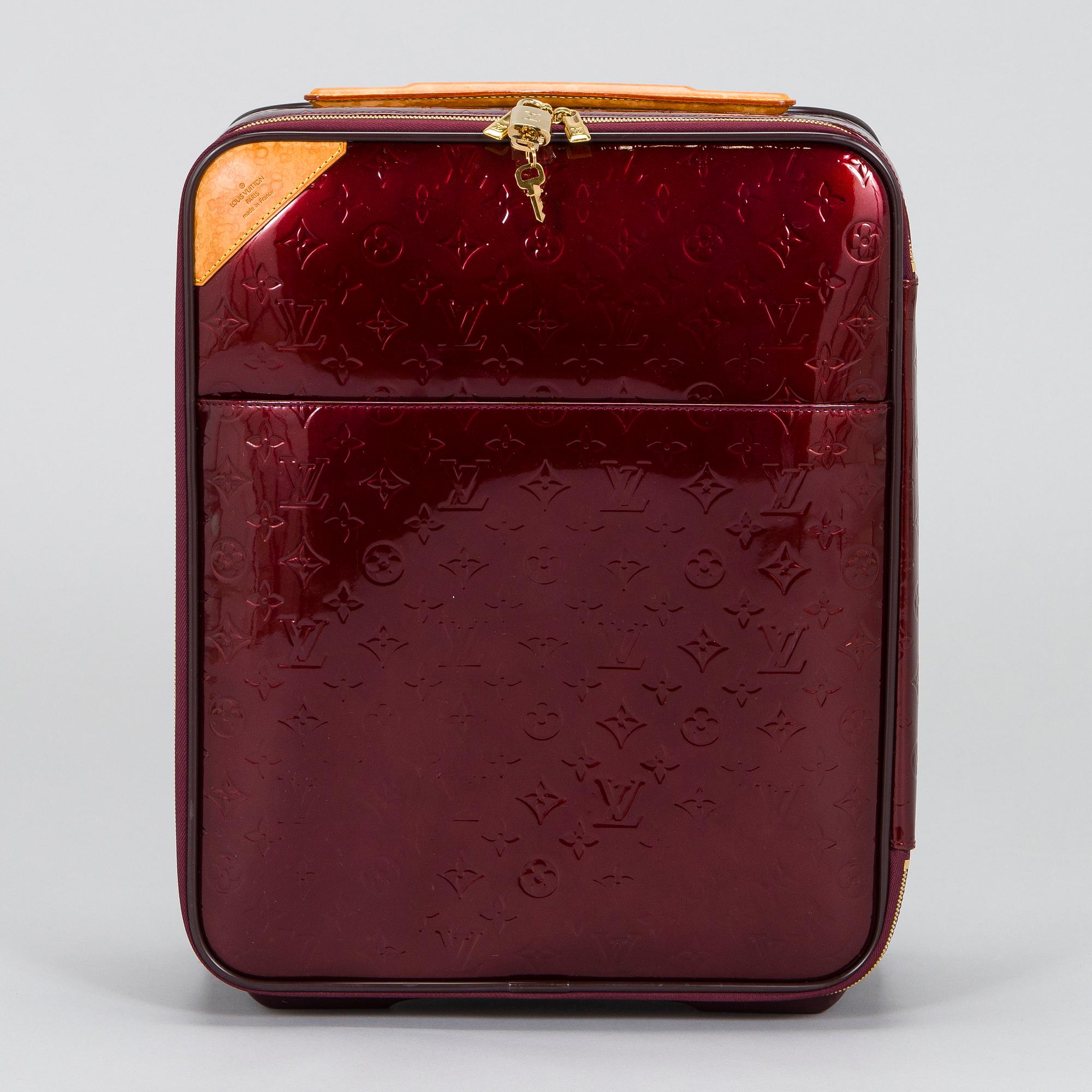 Louis Vuitton, a Monogram Vernis 'Pégase 45', suitcase.
