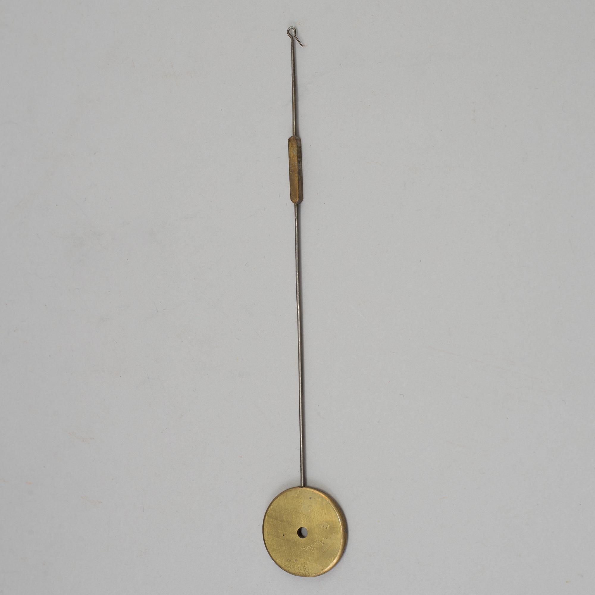 A 19th century French brass mantle clock pendulum Maviez à Paris.