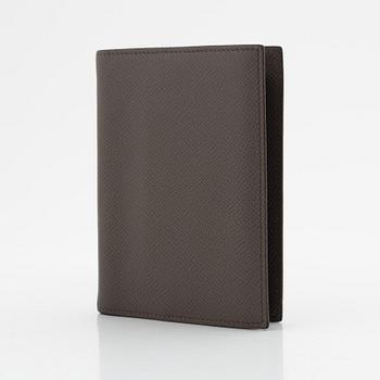 Hermès, notebook with leather case.