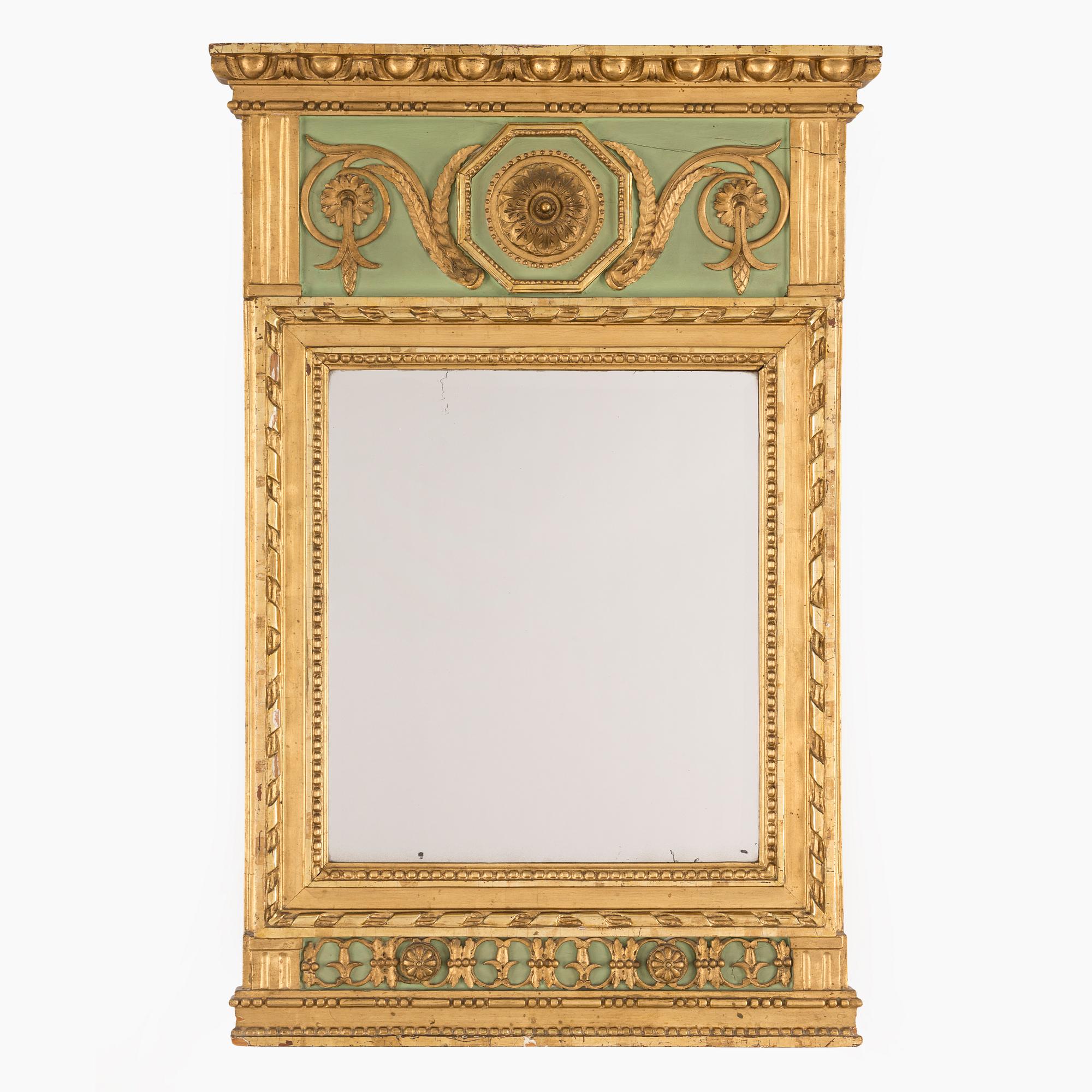 A late gustavian mirror, Stockholm hallmark 1793.