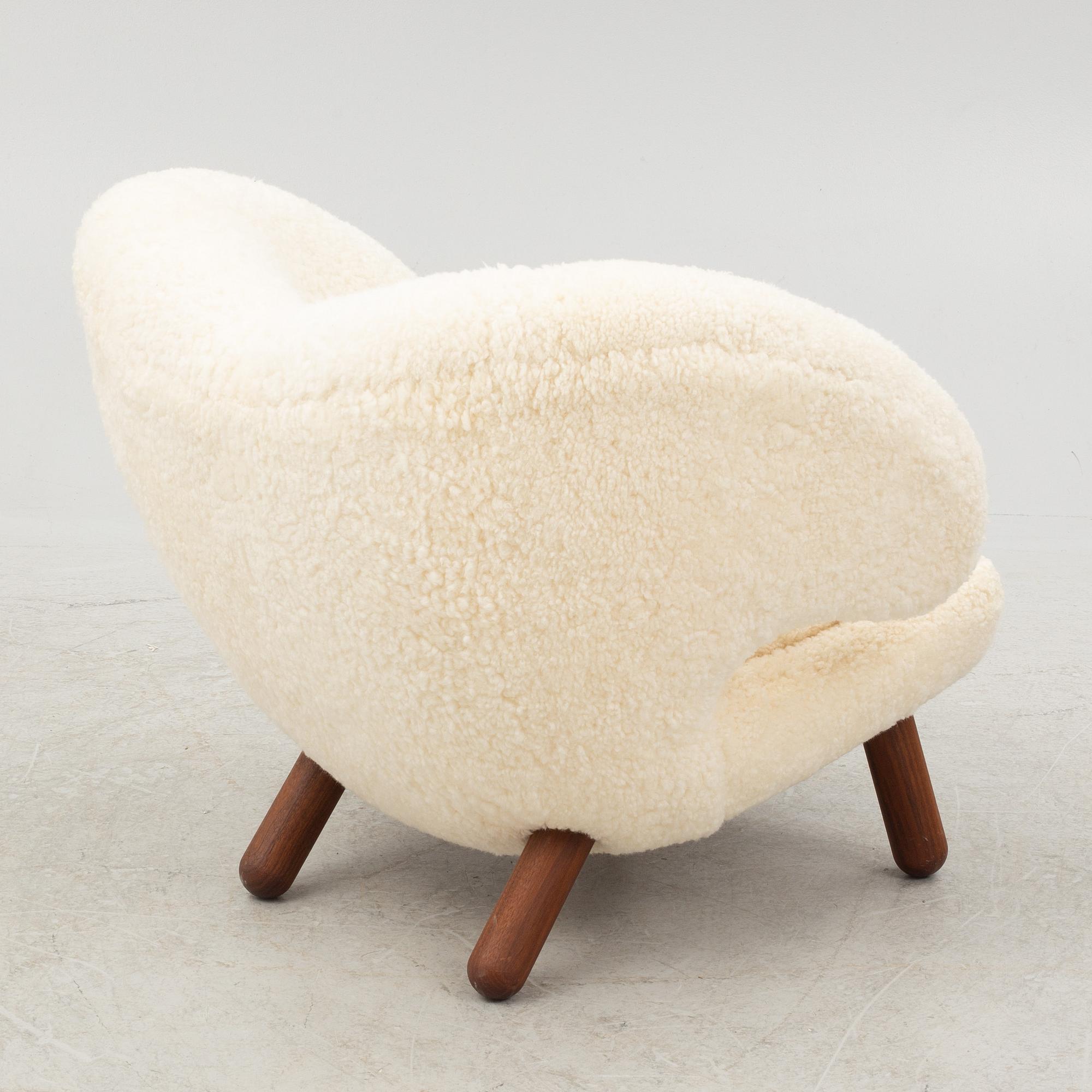 Finn Juhl, a' Pelican Chair' armchair, House of Finn Juhl, Denmark.
