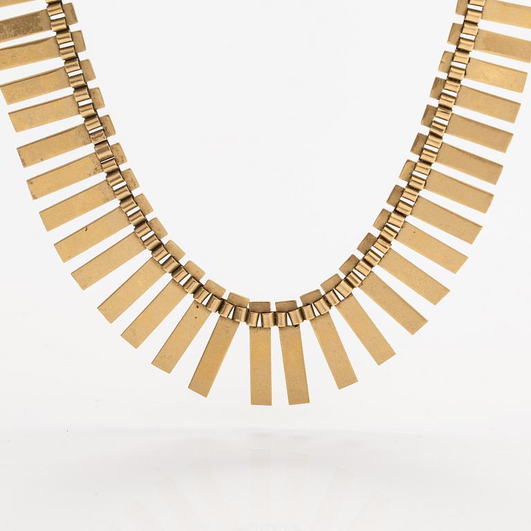 A 14K gold necklace. Import marked Koruteollisuus Tillander, Helsinki 1965.