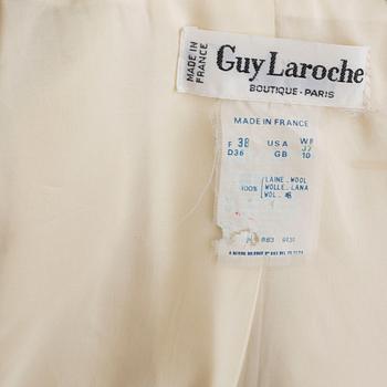 A trench-coat by Guy Laroche.