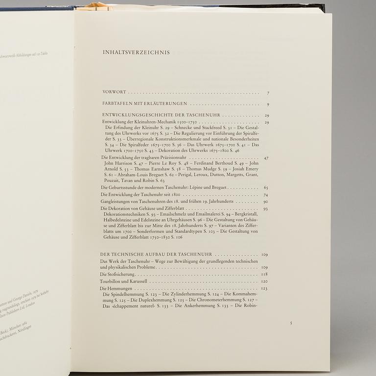 A set of 5 watch books.