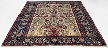 An antique Isfahan rug, ca 235 x 145 cm.