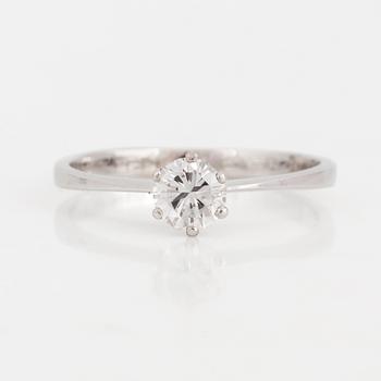 A brilliant-cut diamond ring.