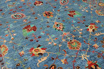 A Khorjin carpet with a Ziegler pattern, c. 307 x 252 cm.