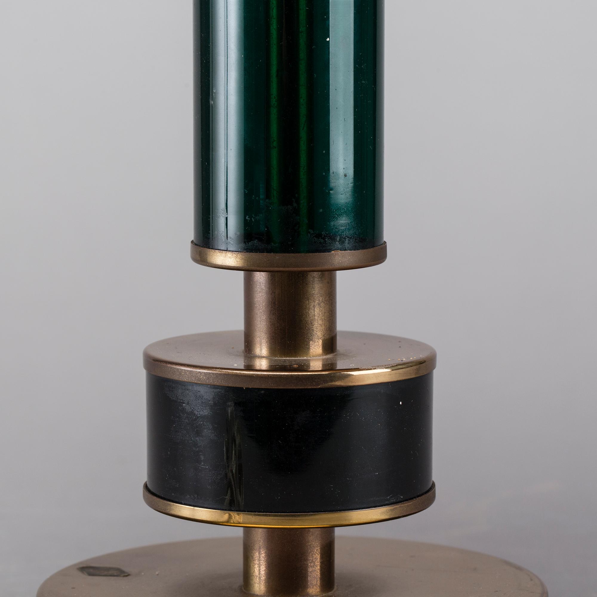 A BRASS AND GLASS TABLE LAMP, second half of the 20th century.