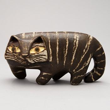 A Ceramic Figurine, signed T Kaasinen Arabia Finland.