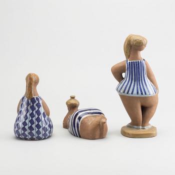 LISA LARSON, a set of three signed ceramic figurines.