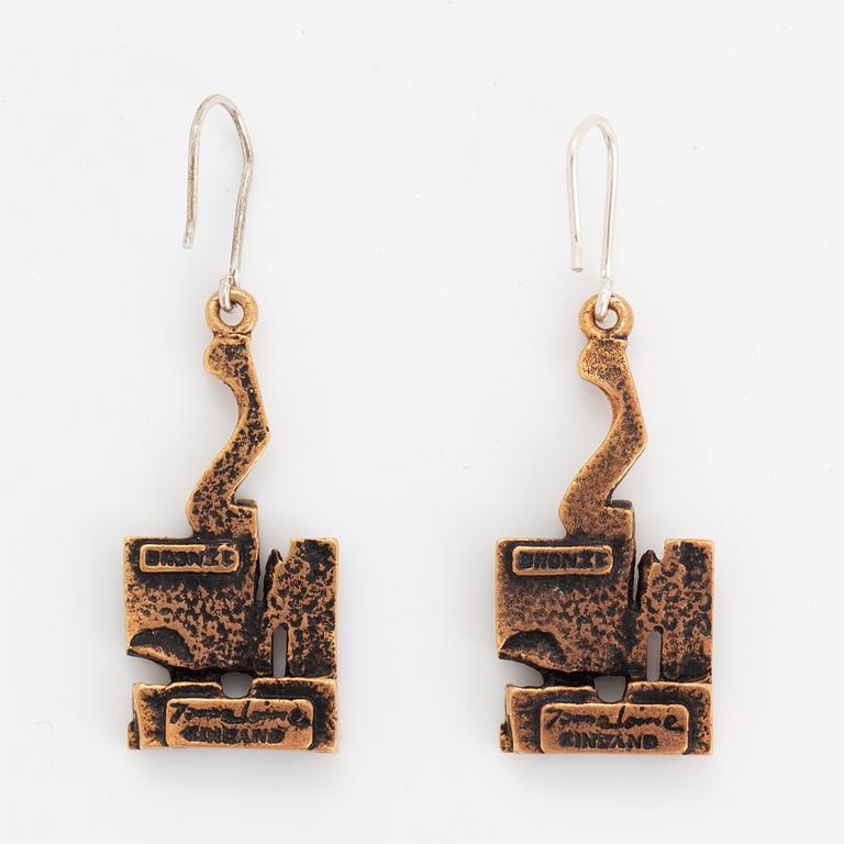 A pair of Jorma Laine earrings in bronze.