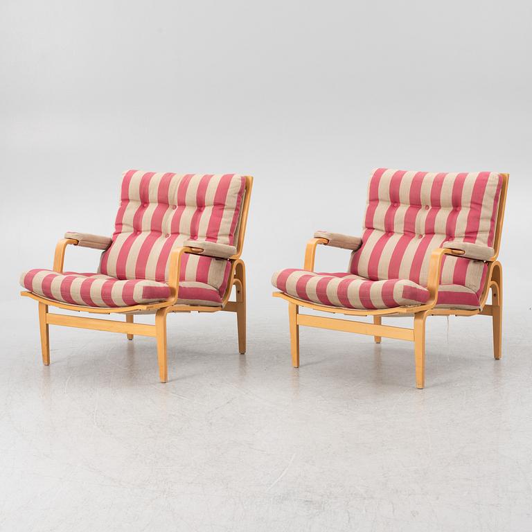 Bruno Mathsson, a pair of "Ingrid" armchairs, Dux, Sweden, second half of the 20th century.