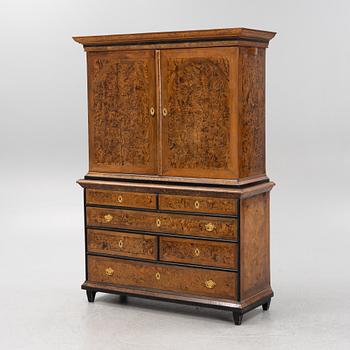 A burr alder, elm, and gilt-brass mounted late Baroque cabinet, first part of the 18th century.