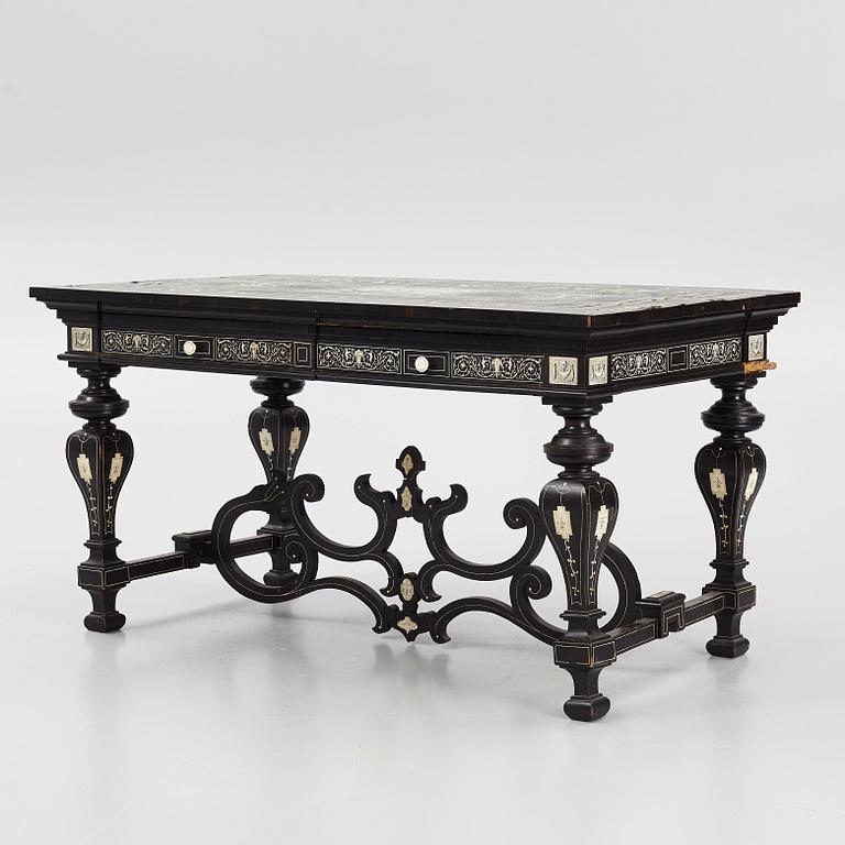 A Renaissance-style ebony, ebonized and ivory-inlaid library table, late 19th century, presumably Germany.