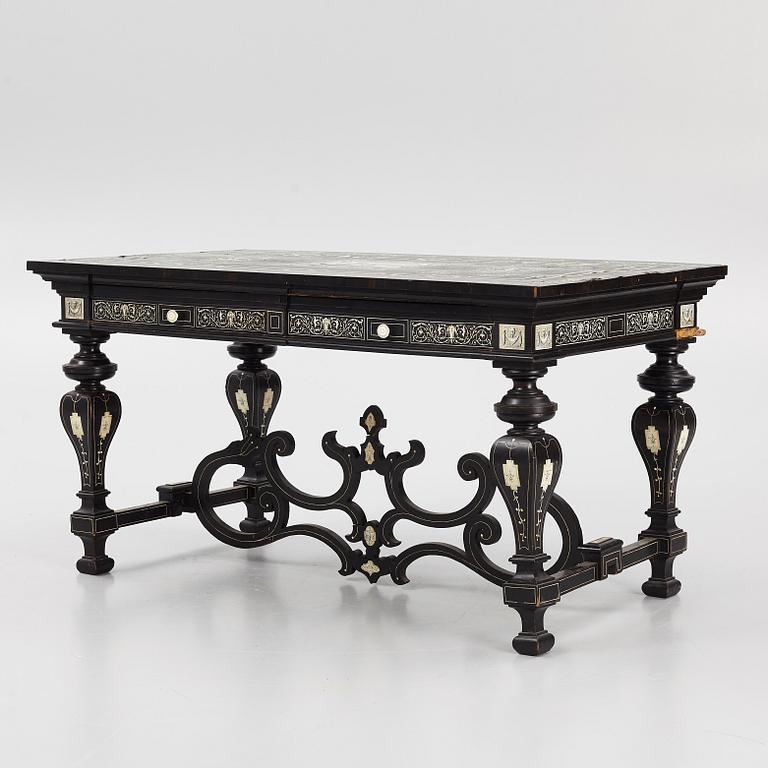 A Renaissance-style ebony, ebonized and ivory-inlaid library table, late 19th century, presumably Germany.