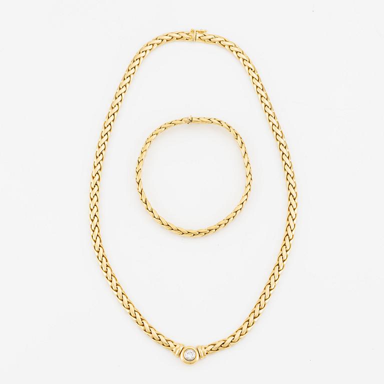 Collier/armband med en rund briljantslipad diamant ca 0.35 ct.