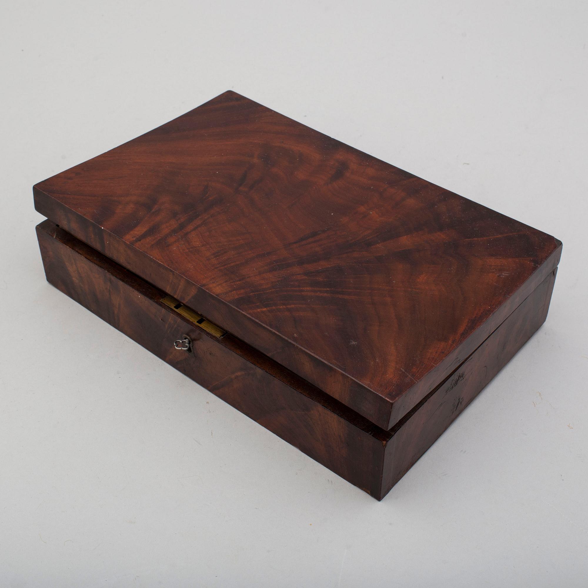 A mid 19th century Belgian rifled percussion pistols with ivory butts in a case.