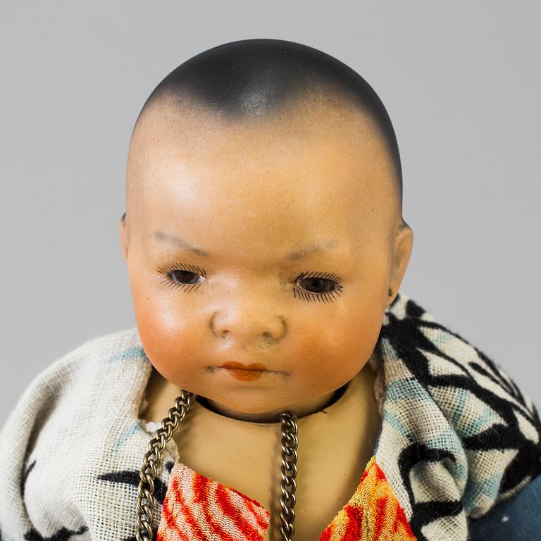 Two oriental bisque head baby dolls by Armand Marseille and Heubach Köppelsdorf, Germany, early 20th century.