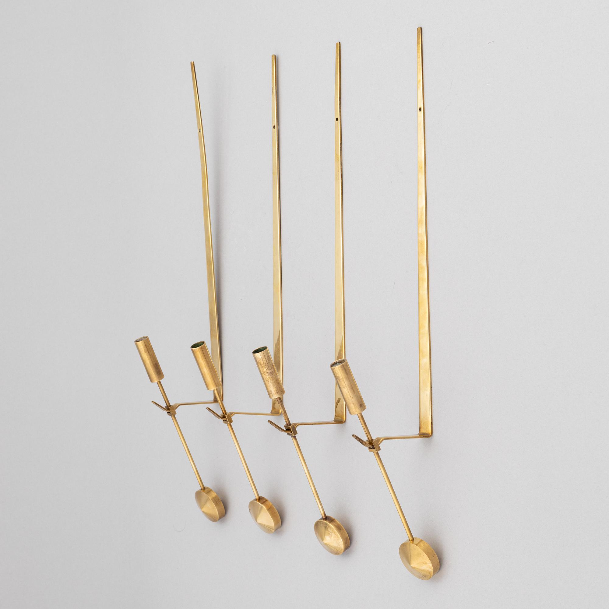 Pierre Forssell, a set of four 'Pendeln' brass wall sconces, Skultuna.