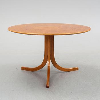 JOSEF FRANK, a model 1028 root veneer and mahogany coffee table from Svenskt Tenn.