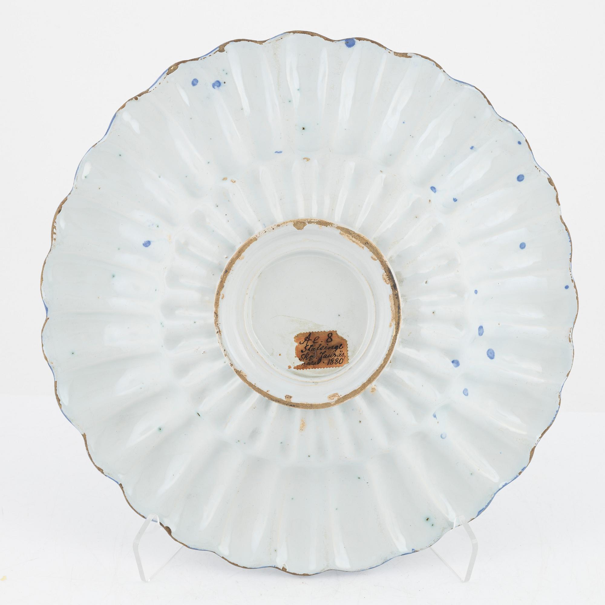 A faiance deep dish, 18th Century.