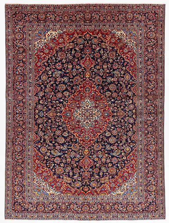 A Keshan carpet, c. 400 x 290 cm.