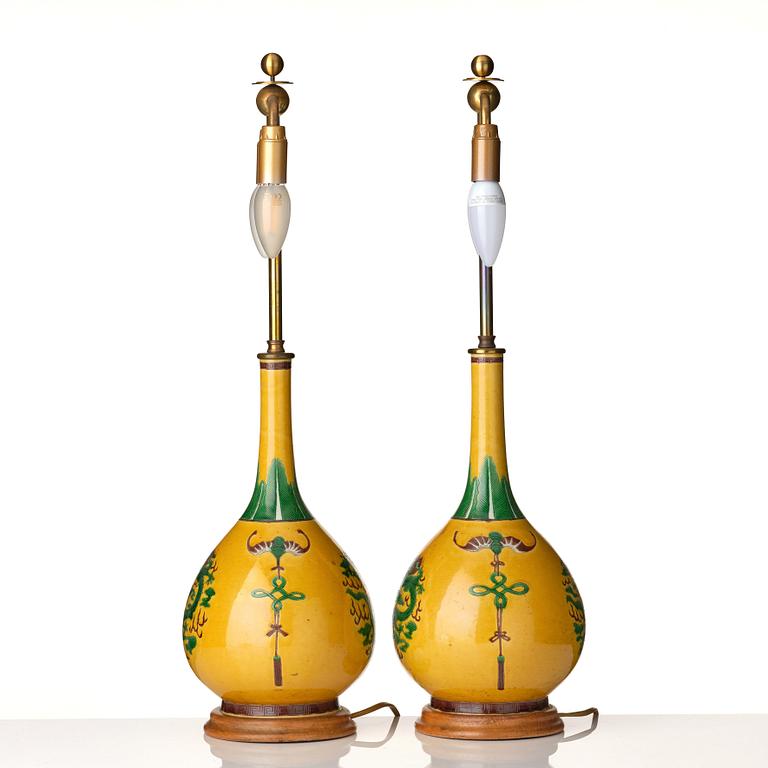 A pair of late yellow ground vases with five clawed dragons, late Qing dynasty.