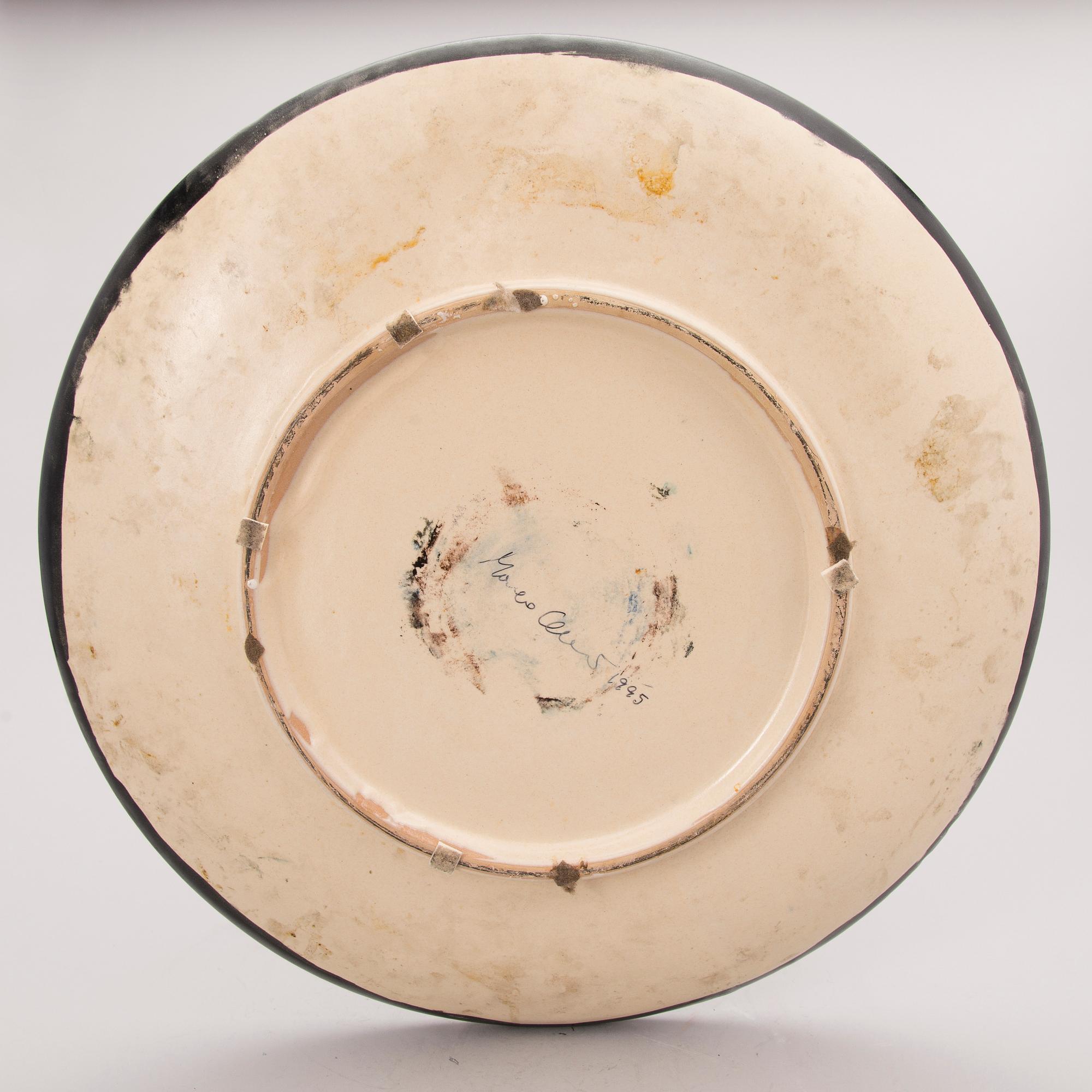 A ceramic bowl, signed and dated 1995.