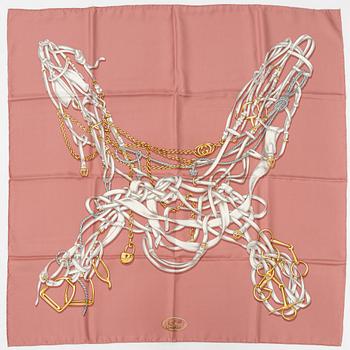 Gucci, a silk scarf.