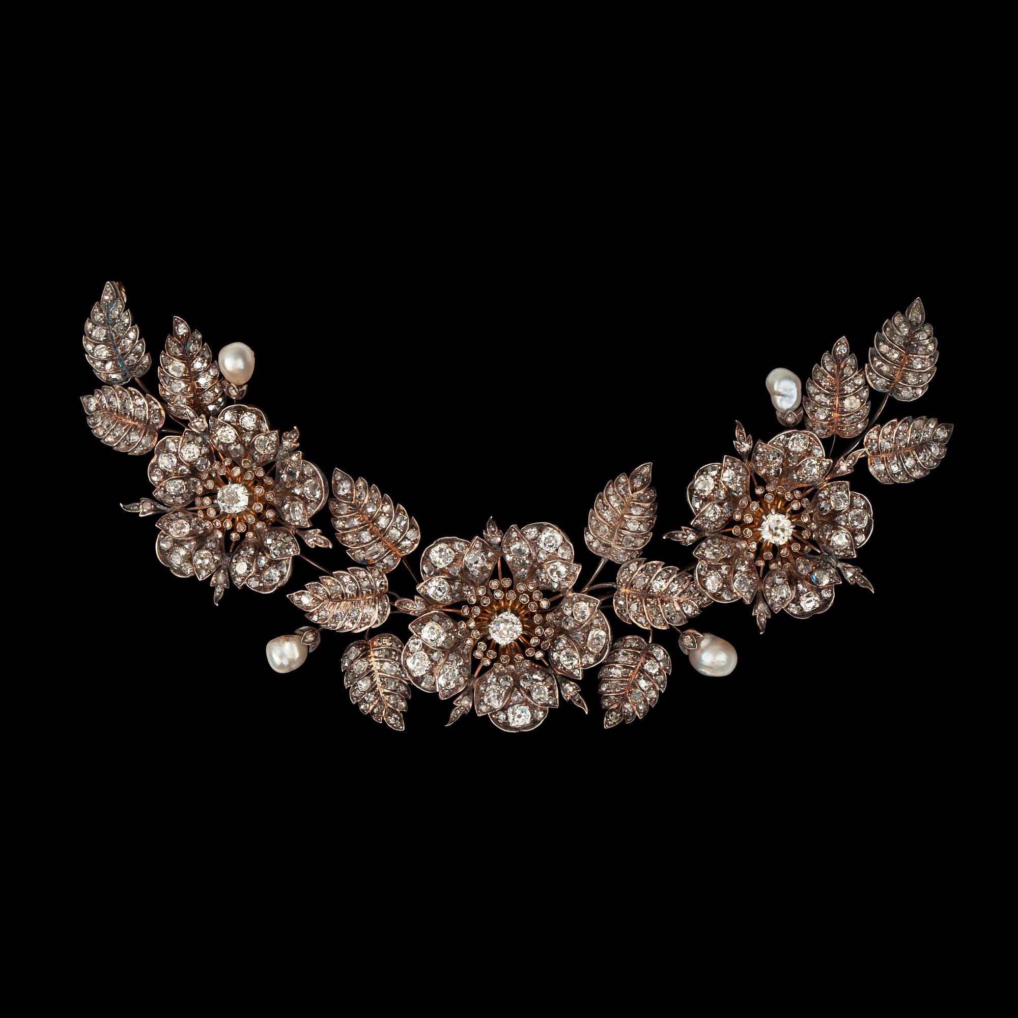 A diamond and natural pearl tiara, made into a necklace. Frame not included. Circa 1870.